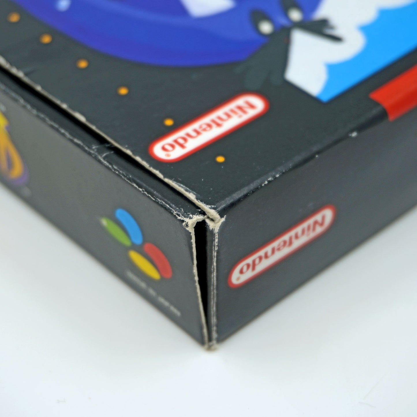 Super Mario World 2 Yoshi's Island für Super Nintendo Entertainment System in Originalverpackung - Detailansicht Gebrauchsspuren